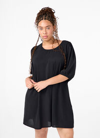 Kort klänning med rosett baktill, Black, Model