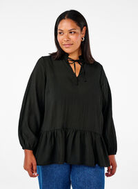 Långärmad blus med peplum, Black, Model